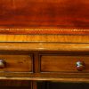 Victorian mahogany pedestal desk with bookcase to rear border