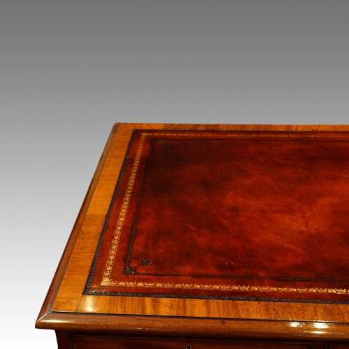Victorian mahogany pedestal desk with bookcase to rear corner