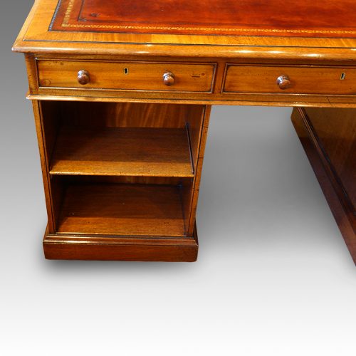Victorian mahogany pedestal desk with bookcase to rear shelves