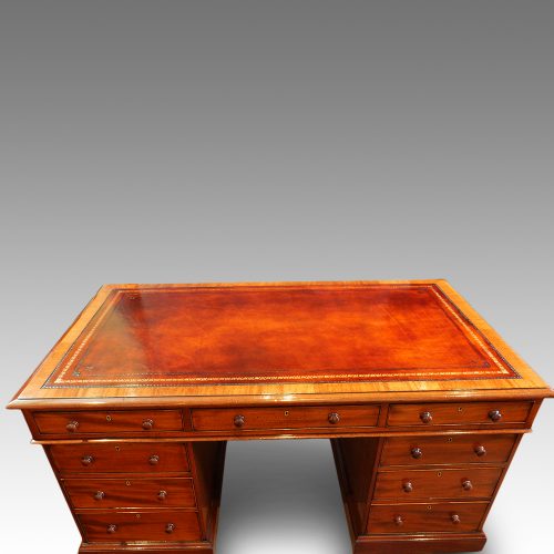 Victorian mahogany pedestal desk with bookcase to rear top