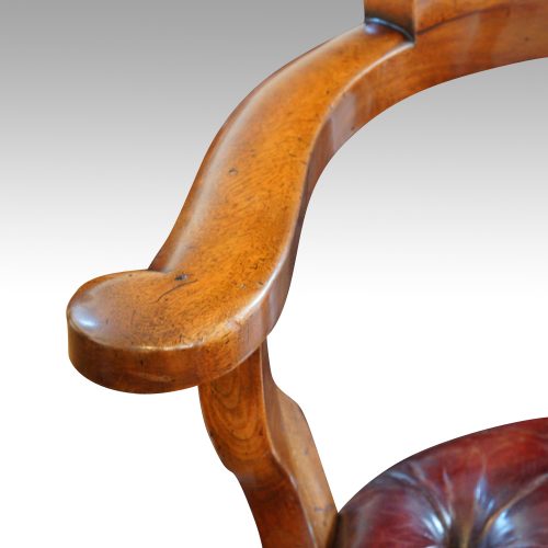 Victorian walnut revolving desk chair arm