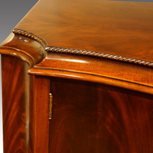 Maples serpentine mahogany side cabinet top beading