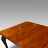 Edwardian mahogany 2 leaf extending dining table end view