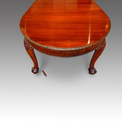 Edwardian mahogany 3 leaf extending dining table end view