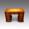Edwardian mahogany pedestal desk front