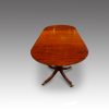 Mahogany twin pillar dining table end view