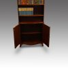 George V bowfronted mahogany bookcase cupboard interior