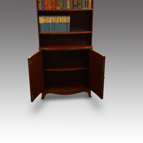 George V bowfronted mahogany bookcase cupboard interior