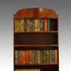 George V bowfronted mahogany bookcase top