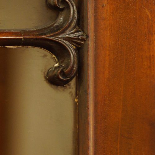 Victorian mahogany narrow bookcase carving