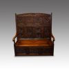 Antique carved oak settle