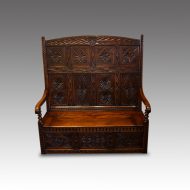 Antique carved oak settle