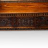 Antique carved oak settle base front
