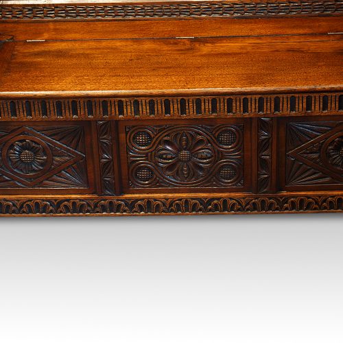 Antique carved oak settle base front