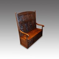 Antique carved oak settle side