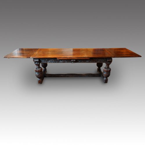 Antique oak large drawleaf dining table