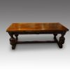 Antique oak large drawleaf dining table closed