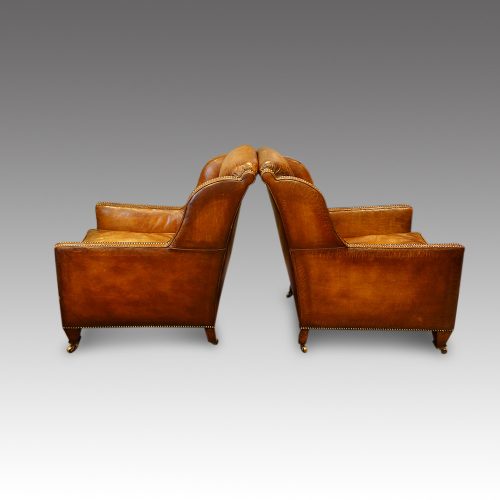Edwardian pair of easy chairs side