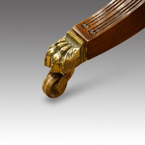 Regency style mahgany dining table brass toe
