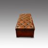 Victorian leather ottoman end view