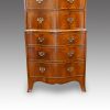 Walnut serpentine tallboy base