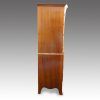 Walnut serpentine tallboy side