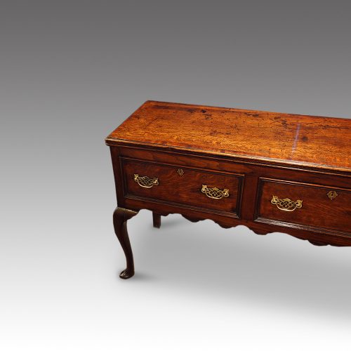 Antique oak cabriole leg dresser base detail