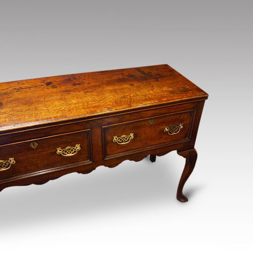 Antique oak cabriole leg dresser base end detail