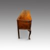 Antique oak cabriole leg dresser base from end