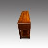 Antique oak potboard dresser base end view