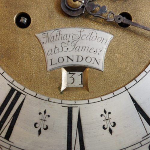 George II walnut longcase clock name plate