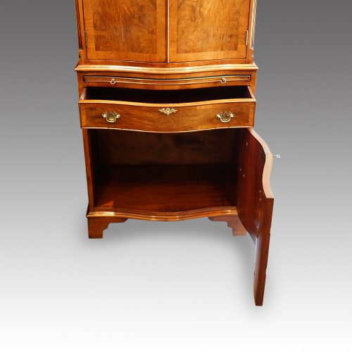 Serpentine walnut press lower cupboard