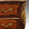 Continental bombe commode corner mount