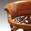Edwardian mahogany swivel desk chair backrail detail