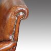 Pair of Victorian leather club chairs back roll