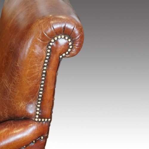 Pair of Victorian leather club chairs back roll