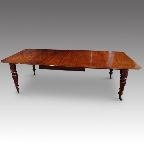 William IV mahogany extending dining table side view