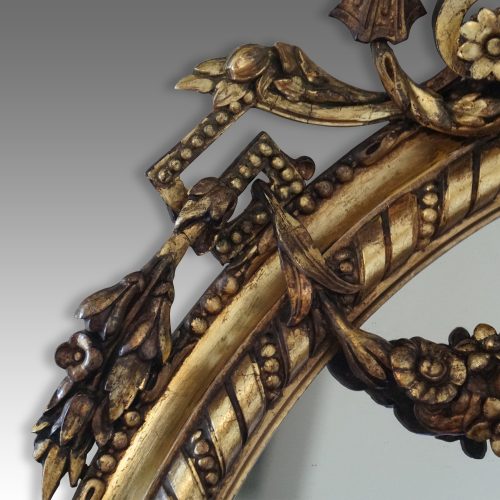 Antique gilt oval mirror shoulder