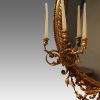 Antique gilt oval mirror side sconce