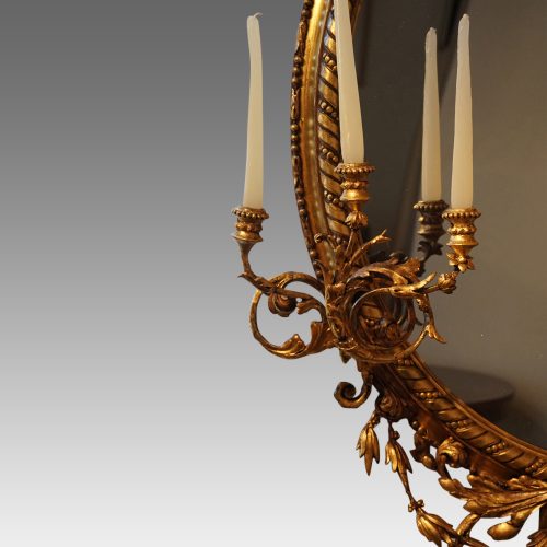 Antique gilt oval mirror side sconce