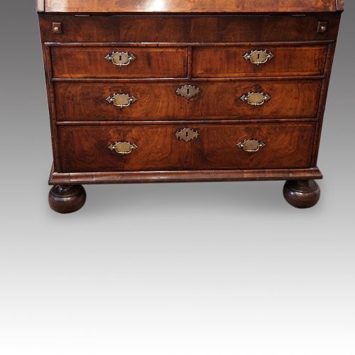 Queen Anne walnut bureau bookcase base detail
