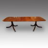 Regency style mahogany twin pillar dining table
