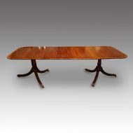 Regency style mahogany twin pillar dining table