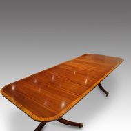 Regency style mahogany twin pillar dining table view from end