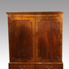 George III mahogany linen press cross banded doors