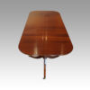 Georgian style mahogany twin pedestal dining table end view