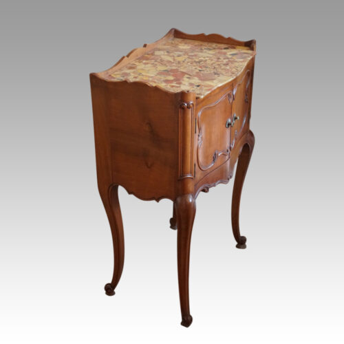 Pair of French bedside cabinets at angle