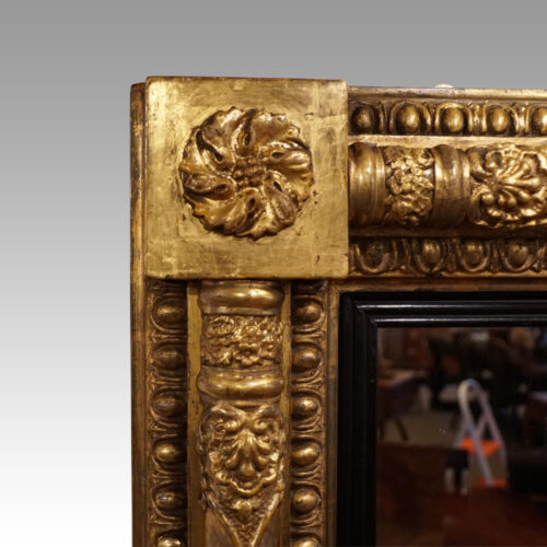 Regency gilt over mantle mirror flower head