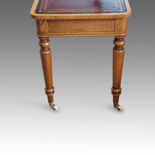 Victorian oak writing table end view