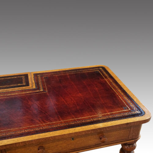 Victorian oak writing table leather detail
